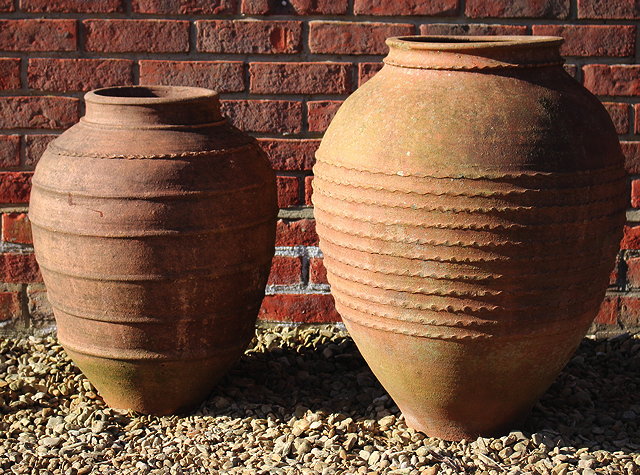 Appraisal: A GREEK TERRACOTTA OVOID PITHOI TYPE JAR or planter approximately