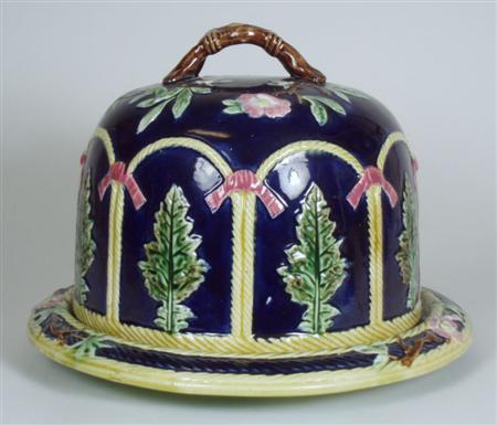 Appraisal: A Victorian majolica cheese cover and stand of circular form