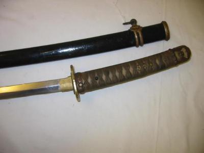 Appraisal: A JAPANESE SHIN-GUNTO OFFICER'S KATANA with braid bound shark skin