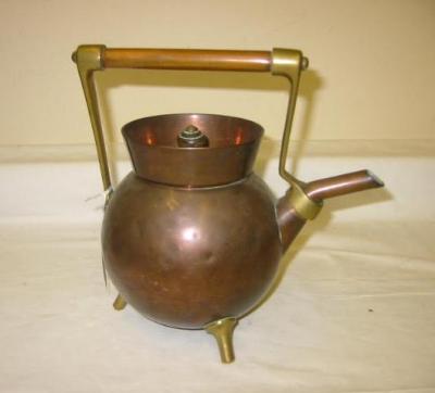 Appraisal: A BENHAM FROUD COPPER AND BRASS KETTLE by Christopher Dresser