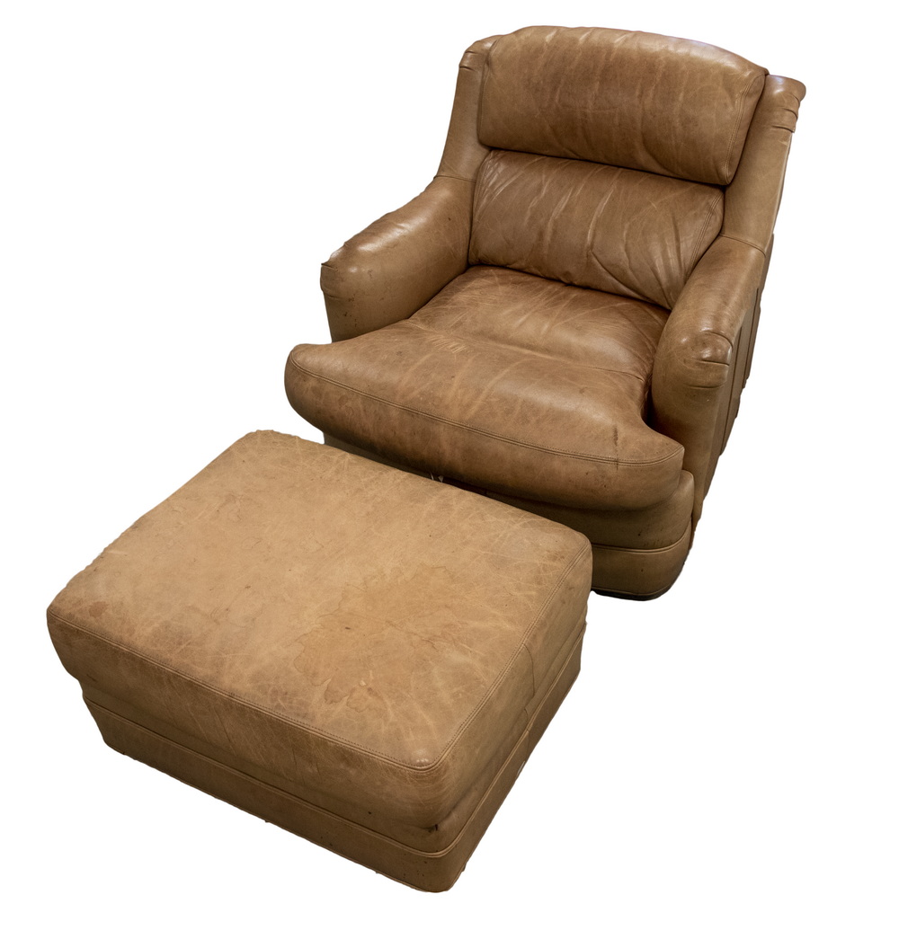 Appraisal: LEATHER ARMCHAIR WITH MATCHING HASSOCK CIRCA 'S Made by Whittemore-Sherrill