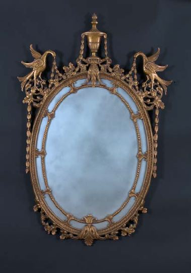 Appraisal: George V Highly Carved Oval Giltwood Looking Glass in the