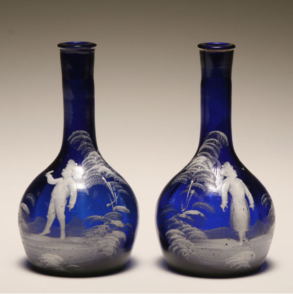 Appraisal: Pair Mary Gregory cobalt barber bottles hand painted children in