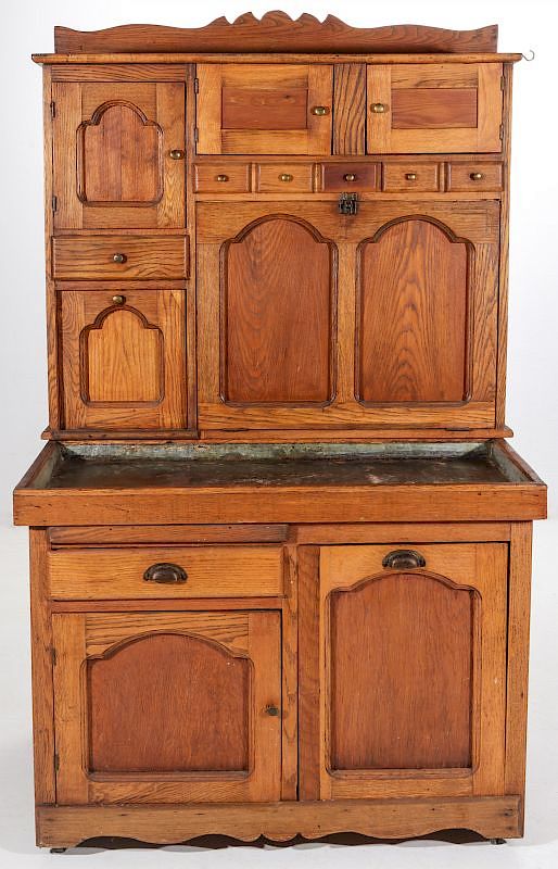 Appraisal: AN UNUSUAL MULTI-DRAWER KITCHEN CABINET Three end drawers variety of