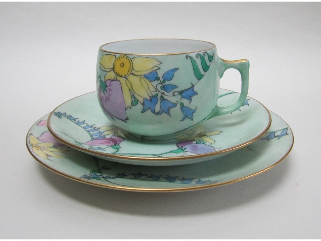 Appraisal: ELIZABETH MARY WATT Five porcelain trios painted with garden flowers