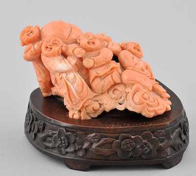 Appraisal: A Carved Coral Figural Carved from a single coral specimen