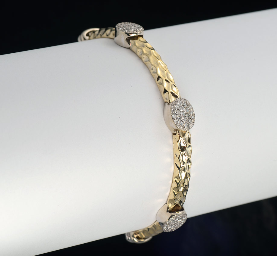 Appraisal: TWO TONE GOLD DIAMOND BRACELET K yellow and white gold