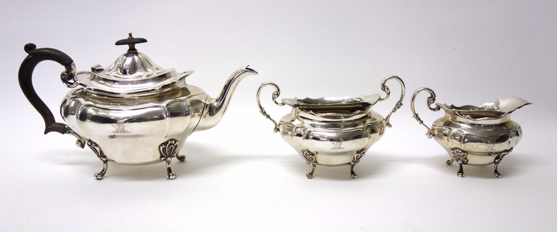 Appraisal: A silver three piece tea set comprising a teapot a