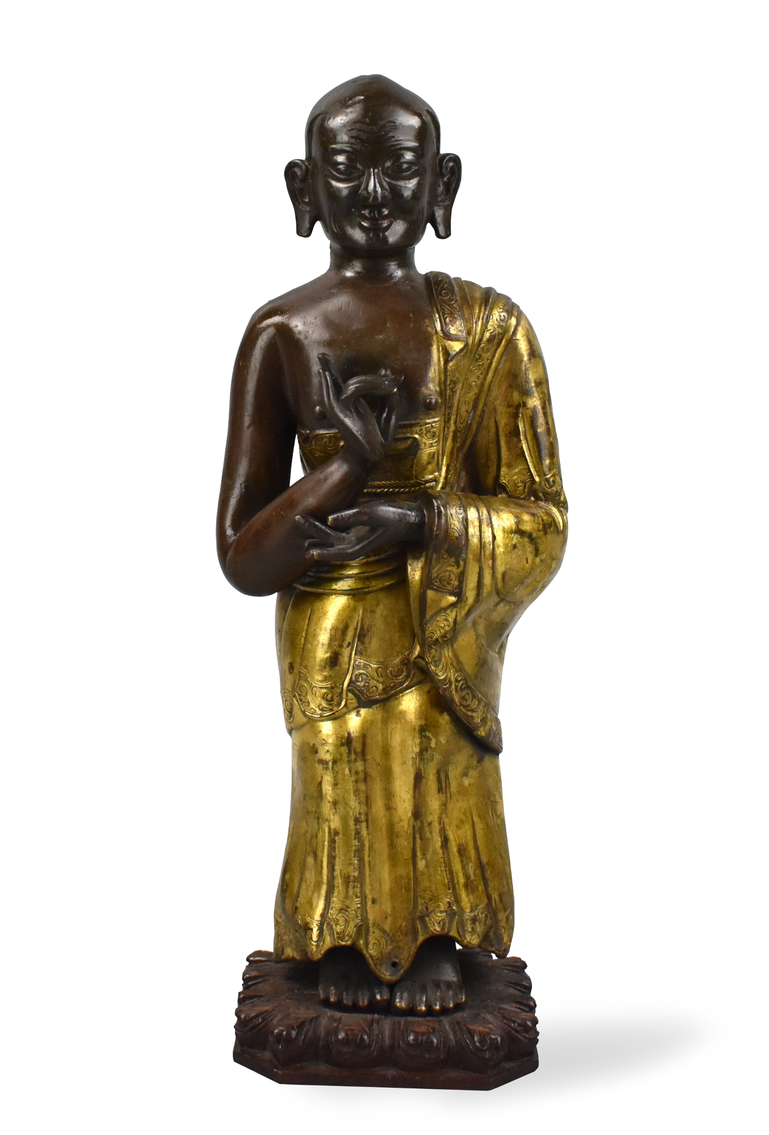 Appraisal: A gilt bronze repousse figure of a buddhist monk th