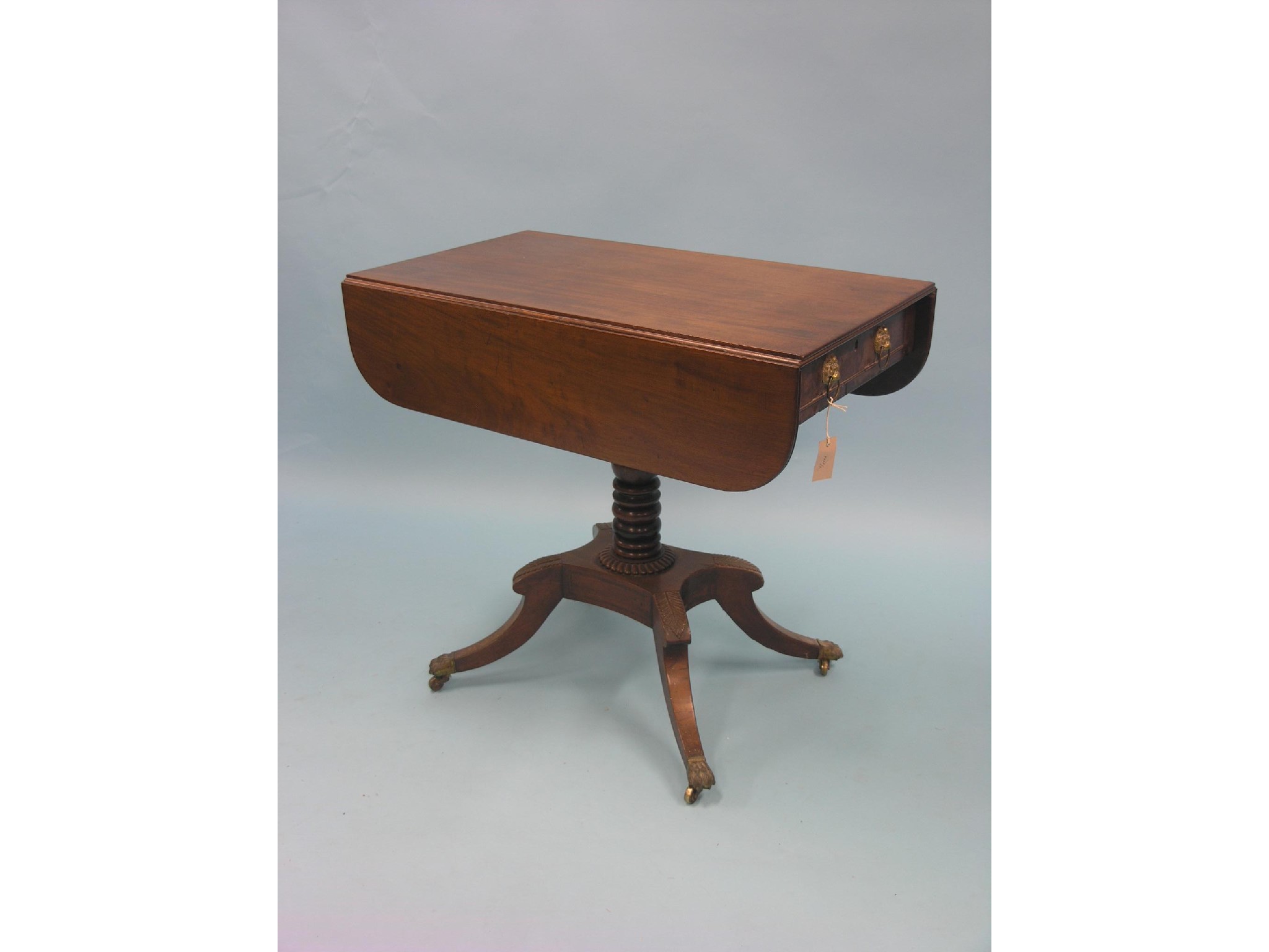 Appraisal: A George IV mahogany centre table rectangular top with drop-leaves