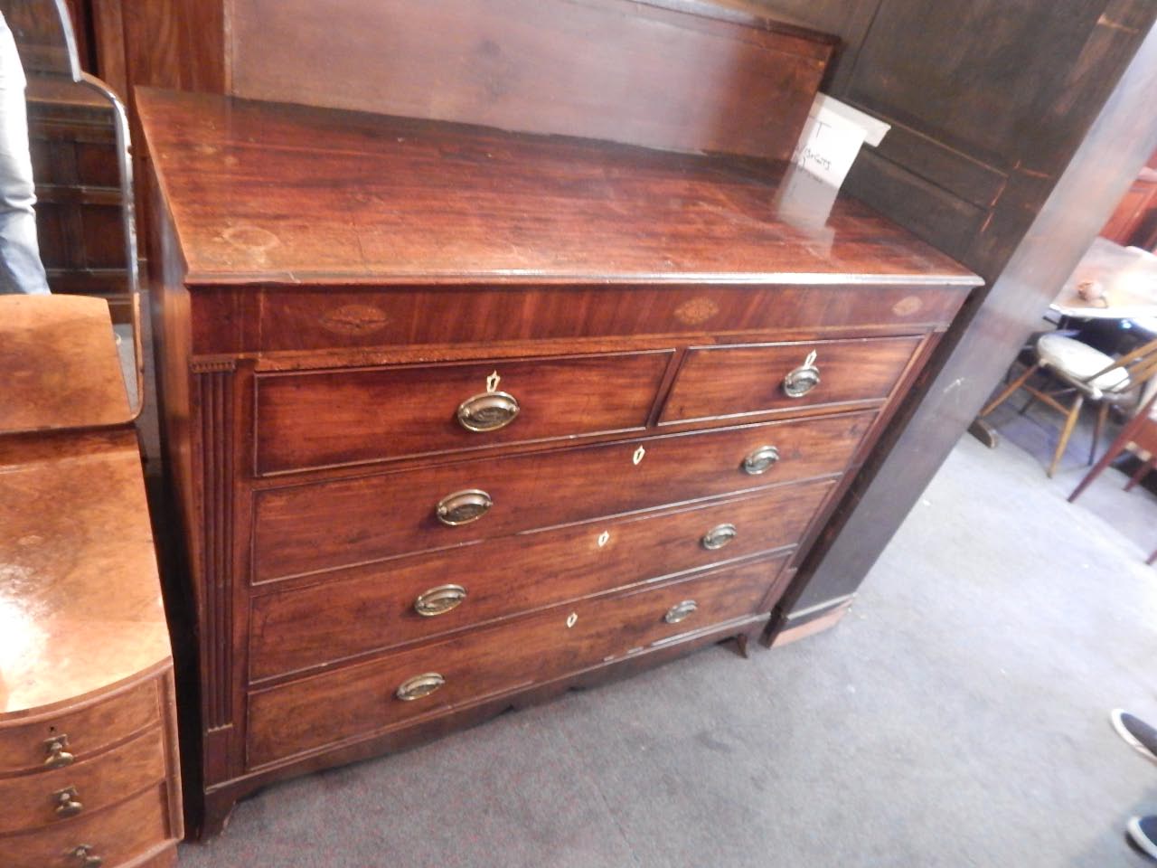 Appraisal: An early thC mahogany and inlaid chest of drawers the