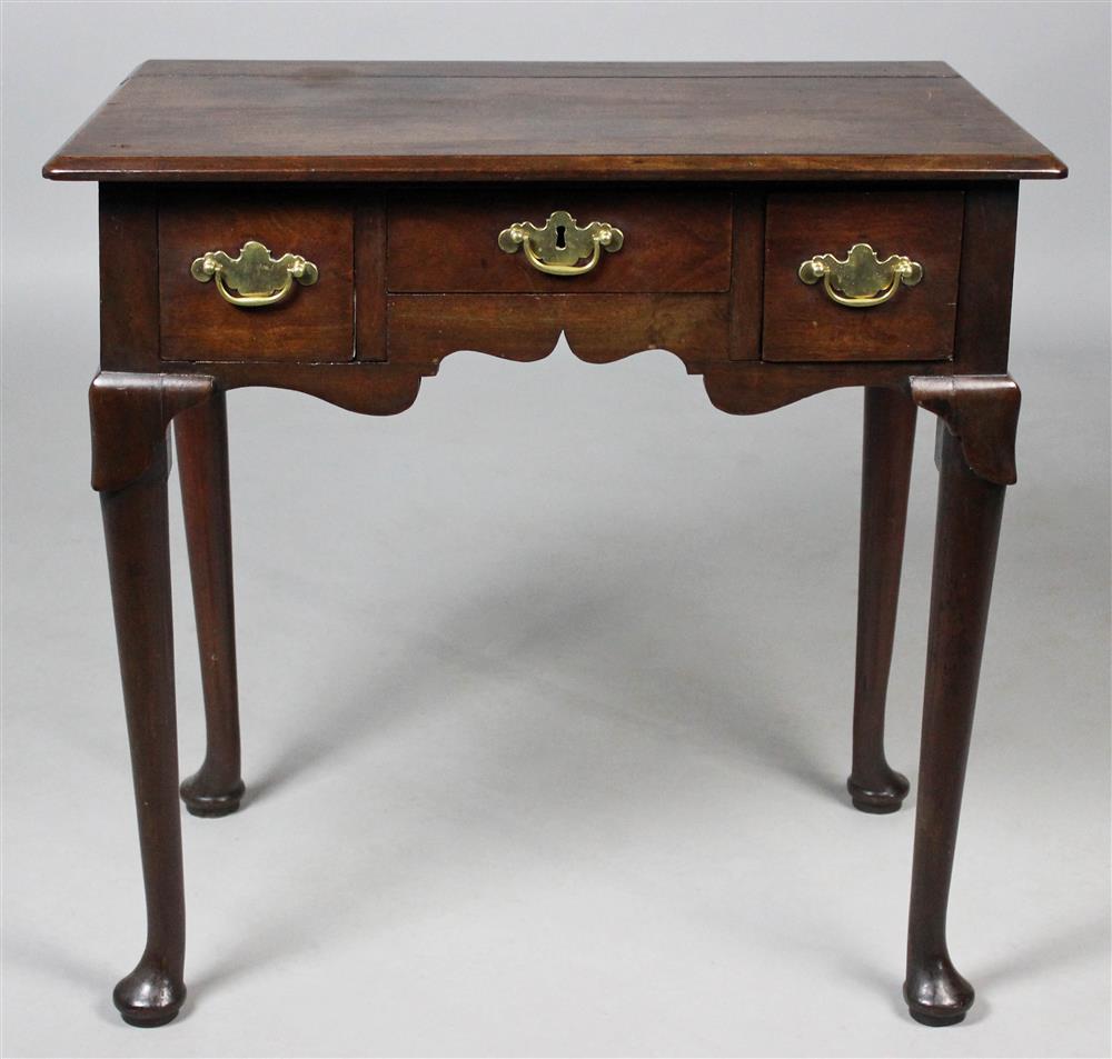 Appraisal: QUEEN ANNE MAHOGANY LOWBOY having a rectangular top with molded