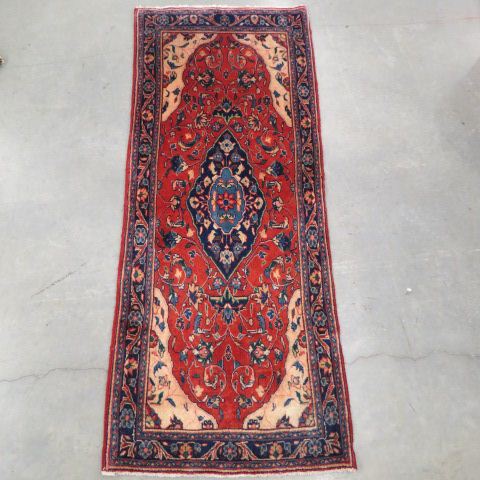 Appraisal: Sarouk Handmade Persian Rug elegant floral salmon field blue trim