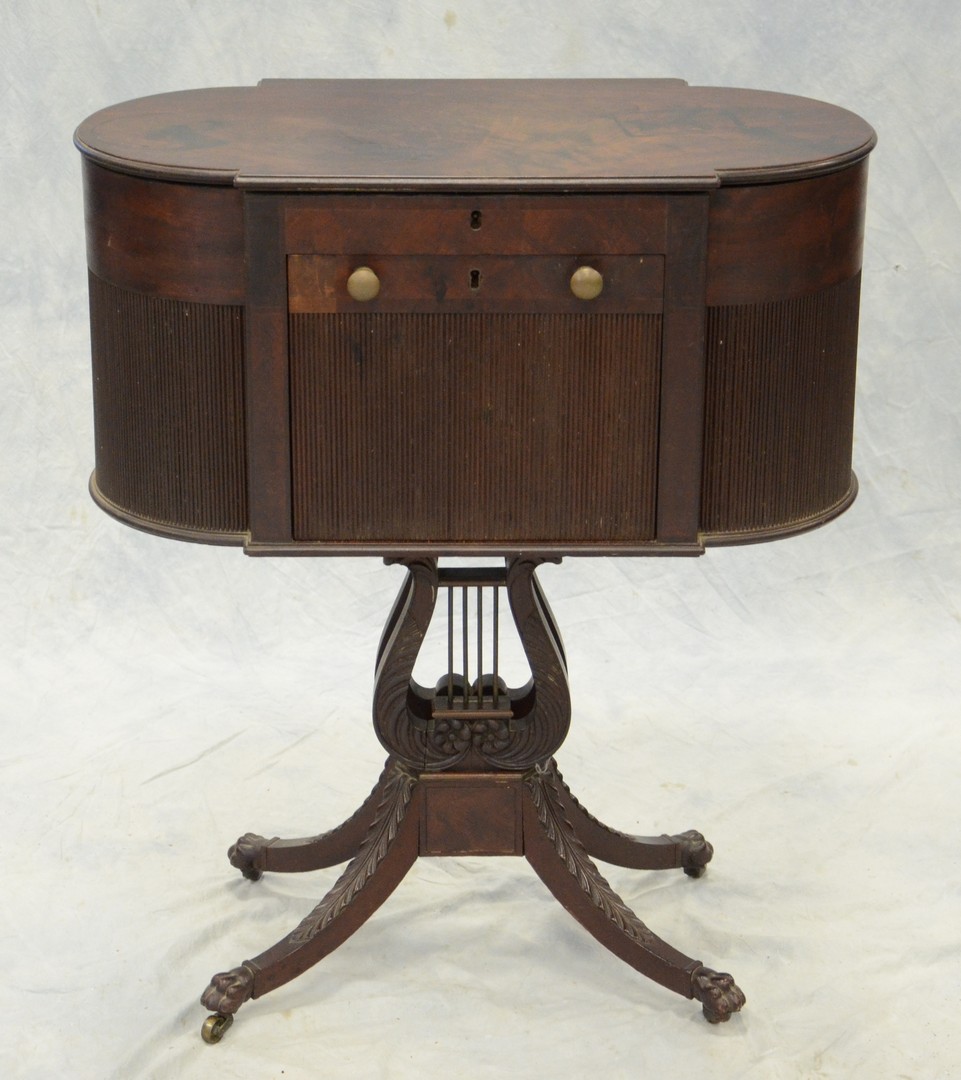 Appraisal: Carved mahogany Federal sewing stand the solid crotch mahogany top