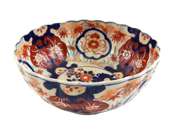 Appraisal: ASIAN Imari bowl with red orange and blue stylized floral