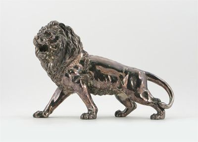 Appraisal: An electroplated model of a lion unmarked cm in long