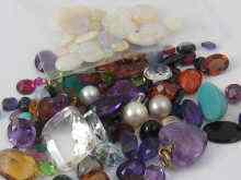 Appraisal: A large quantity of mixed loose polished stones including amethyst