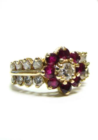 Appraisal: K Yellow gold lady's diamond and ruby ring in flower