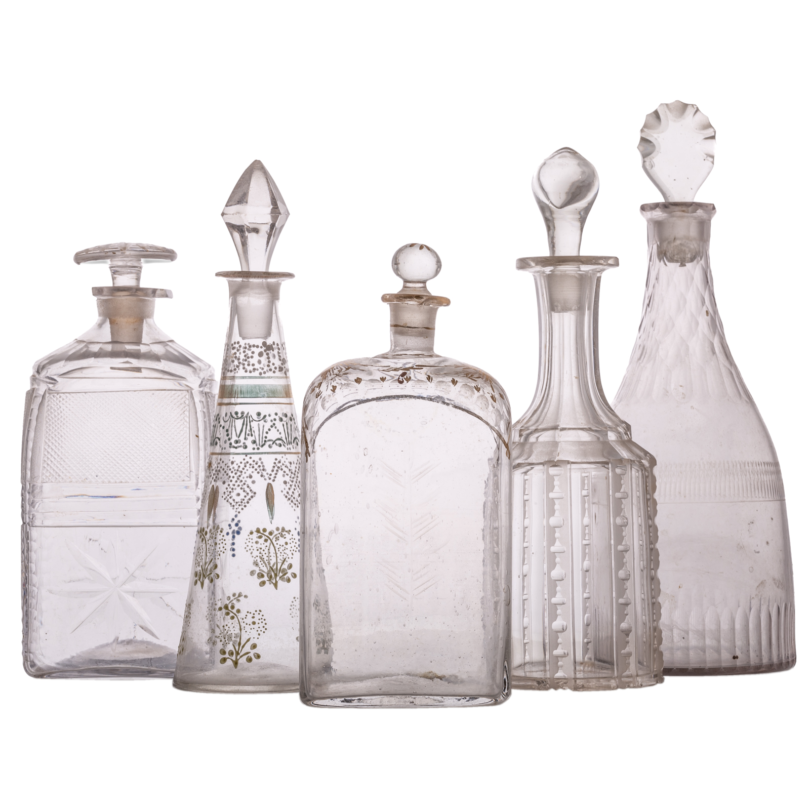 Appraisal: FIVE ASSORTED GLASS DECANTERS th century includes Anglo-Irish faceted cut