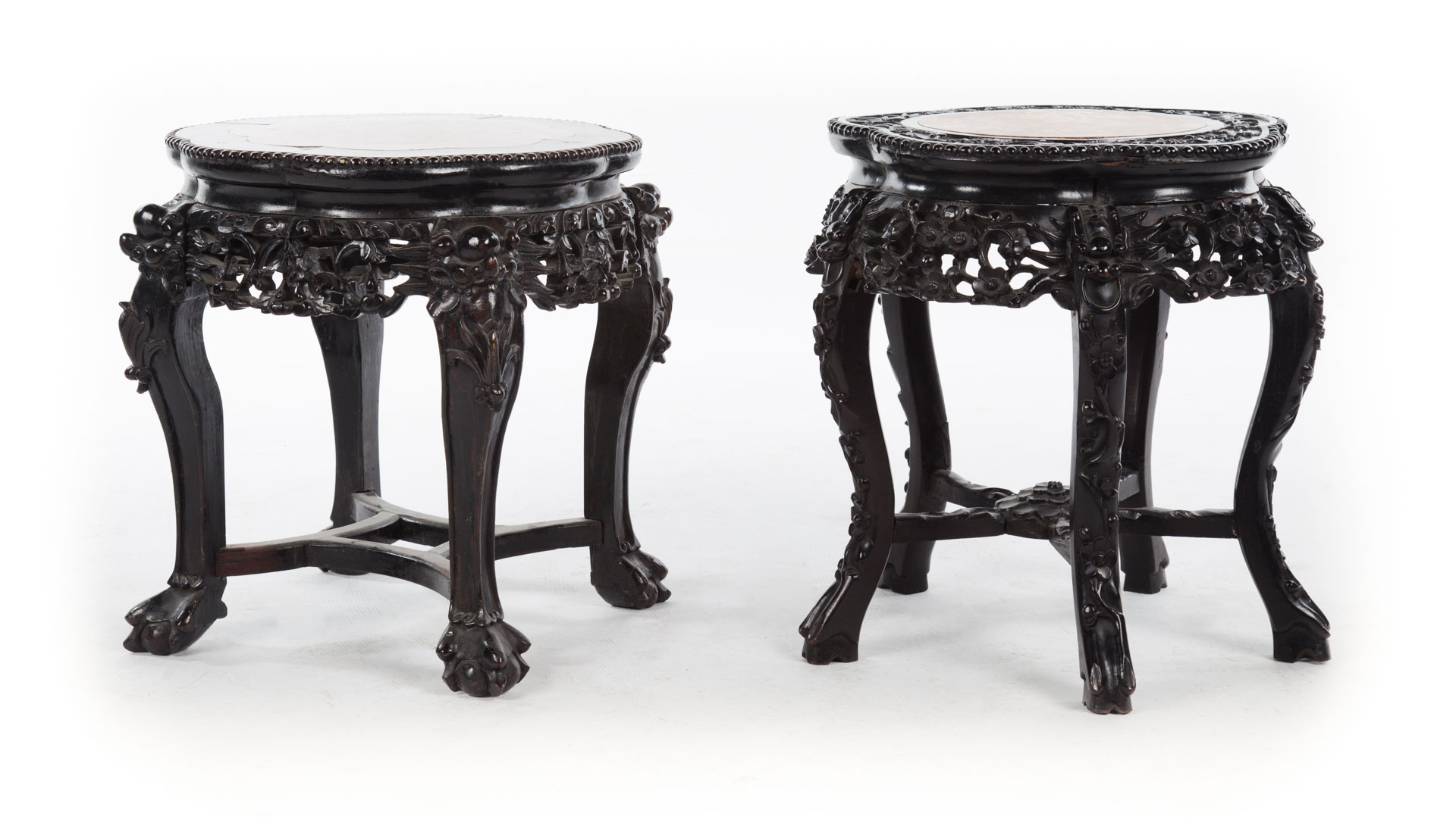 Appraisal: Chinese Export carved hardwood stands round red marble inset top