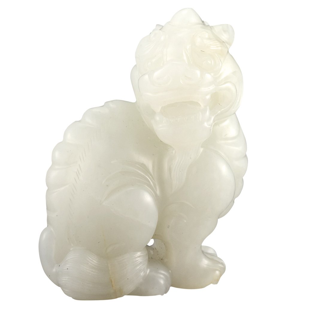 Appraisal: Chinese White Jade Qilin th th Century Seated with the