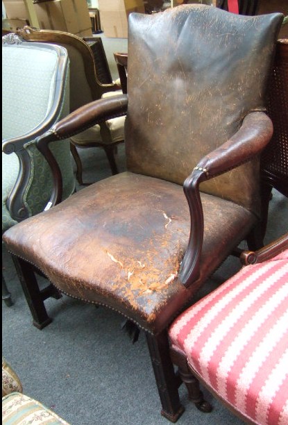 Appraisal: A George III mahogany Gainsborough chair the hump crested rectangular