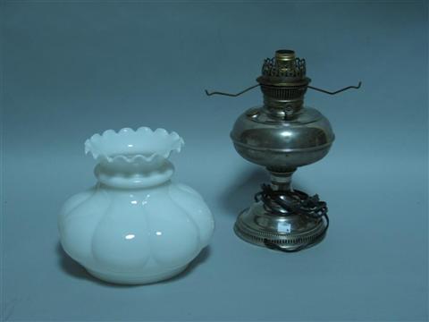 Appraisal: SILVERED METAL LAMP WITH MILK GLASS SHADE The nickel-plated kerosene