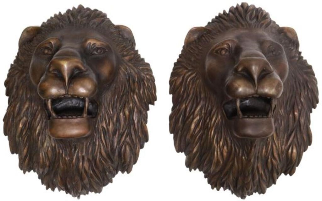 Appraisal: pair Architectural patinated bronze lion masks with mouths ajar approx