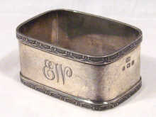 Appraisal: A silver napkin ring hallmarked Birmingham