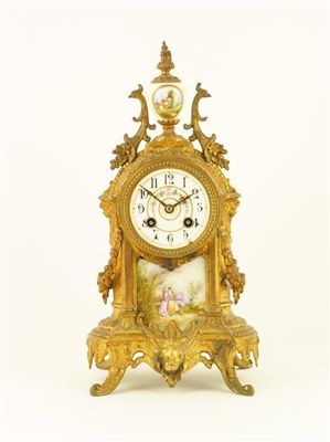 Appraisal: A French gilt spelter and porcelain mounted mantel clock the