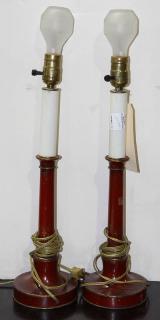 Appraisal: Pair of English style red-painted tole candlesticks mounted as table