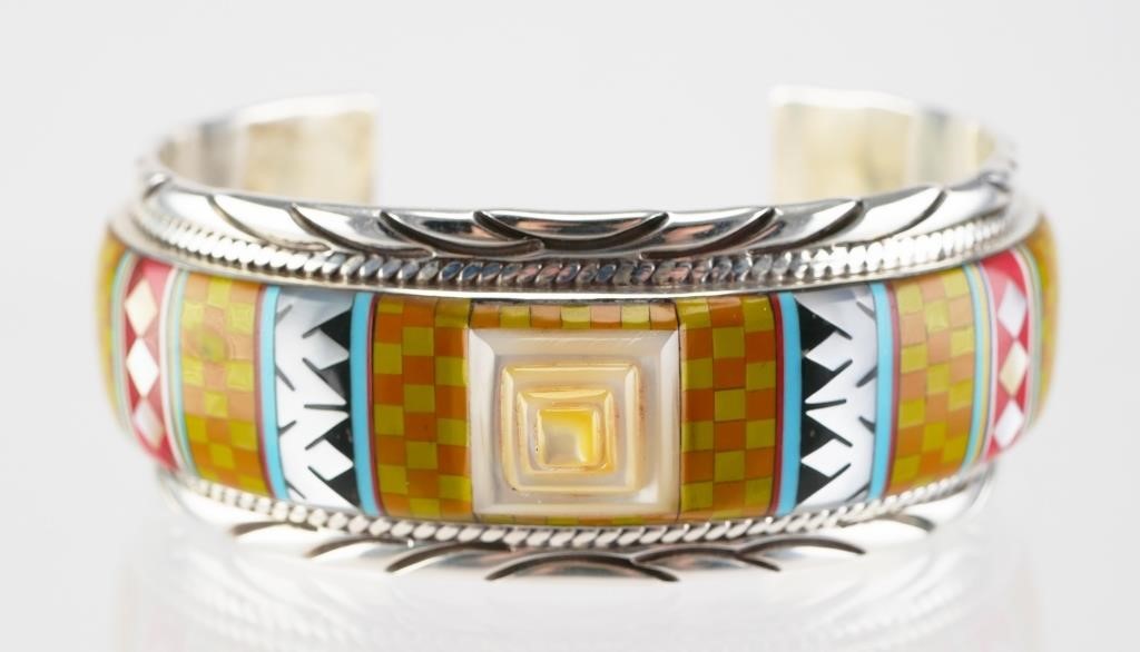 Appraisal: Sterling silver cuff bracelet featuring Native American style multi-colored design