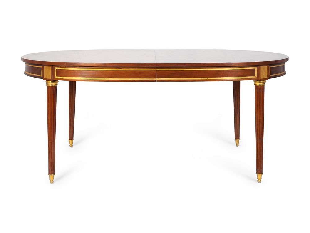 Appraisal: A Louis XVI Style Gilt-Bronze-Mounted Mahogany Extension Dining Table Height