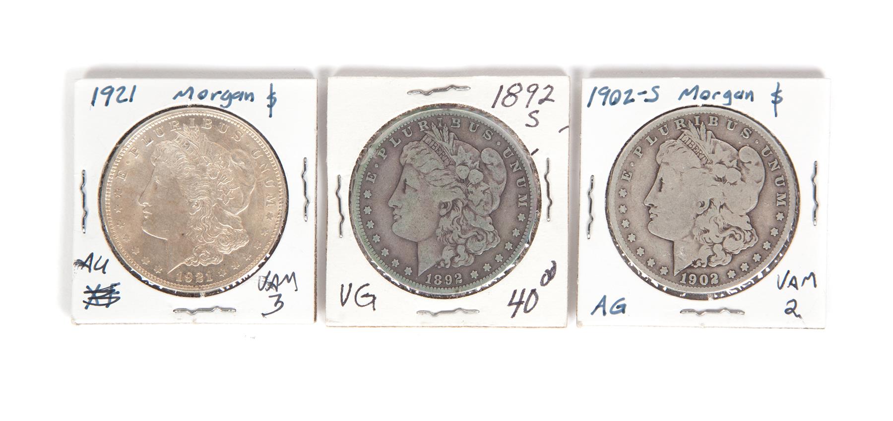 Appraisal: THREE MORGAN SILVER DOLLARS -S possibly VG and a -S