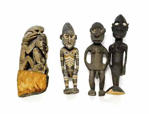 Appraisal: Four Papua New Guinea carved and painted figures tallest -