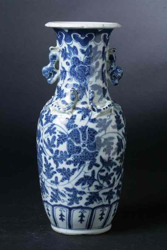 Appraisal: CHINESE BLUE AND WHITE PORCELAIN VASE the century Ovoid-form molded