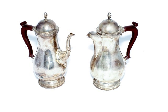 Appraisal: A silver two piece cafe au lait set comprising a