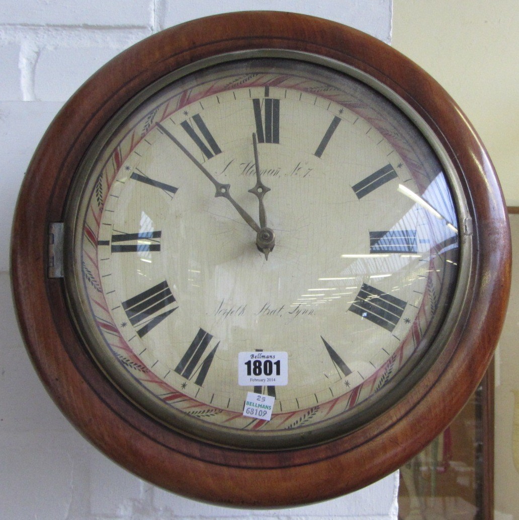 Appraisal: A Victorian postman's alarm clock with mahogany frame and convex