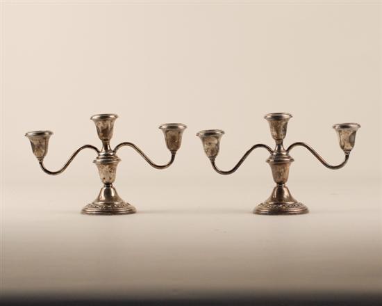 Appraisal: A Pair of Gorham Sterling Candleabra metamorphic reducing from triple