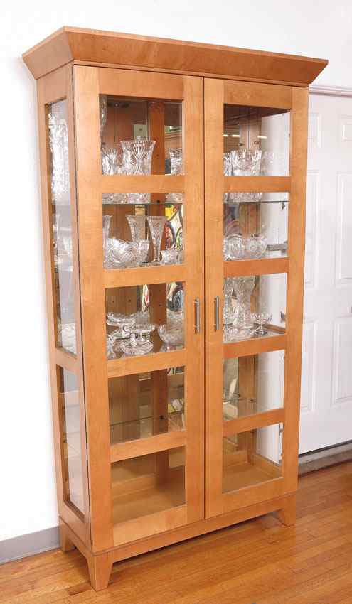 Appraisal: CONTEMPORARY TALL DISPLAY CABINET Double door interior with adjustable glass