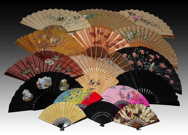 Appraisal: A COLLECTION OF NINETEEN EASTERN FANS with varying painted decoration