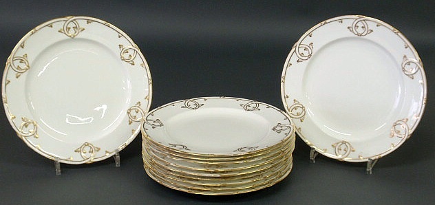 Appraisal: Set of eleven white porcelain dinner plates with gilt decoration