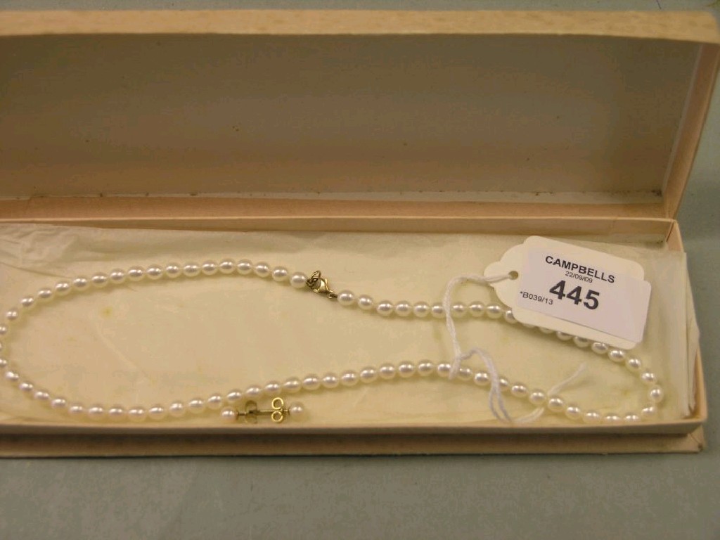 Appraisal: A pearl-type necklace with ct gold clip and a pair