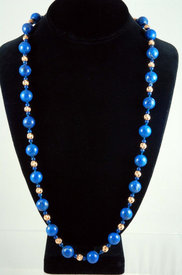 Appraisal: Lapis lazuli bean necklace with marked K yellow gold filgree