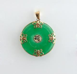 Appraisal: K Yellow Gold Mounted Circular Jade Pendant the rim with