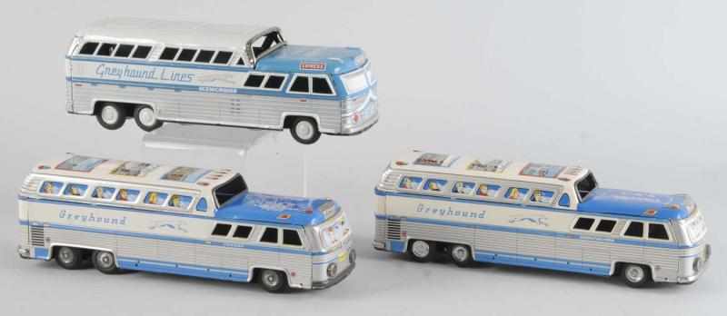 Appraisal: Lot of Tin Greyhound Scenicruiser Bus Toys Description Japanese Friction