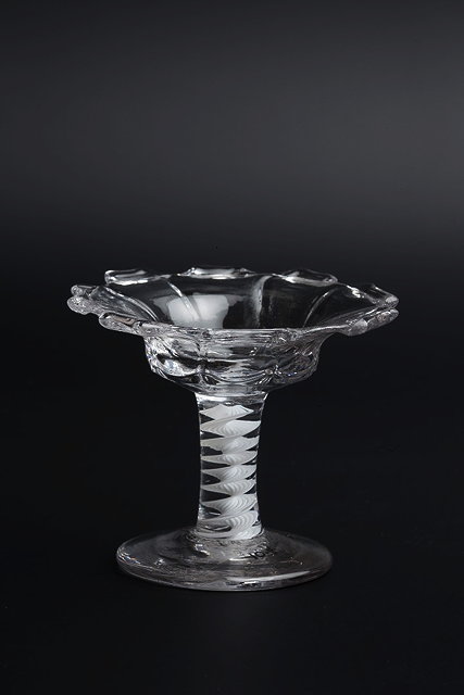 Appraisal: AN TH CENTURY GLASS MINIATURE SWEETMEAT TAZZA with dentil rim