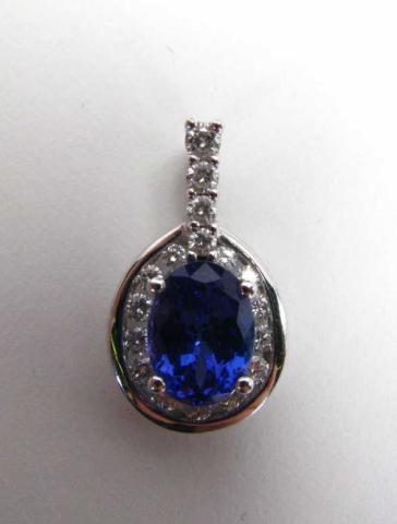 Appraisal: K White Gold Tanzanite and Diamond Pendant with - ct