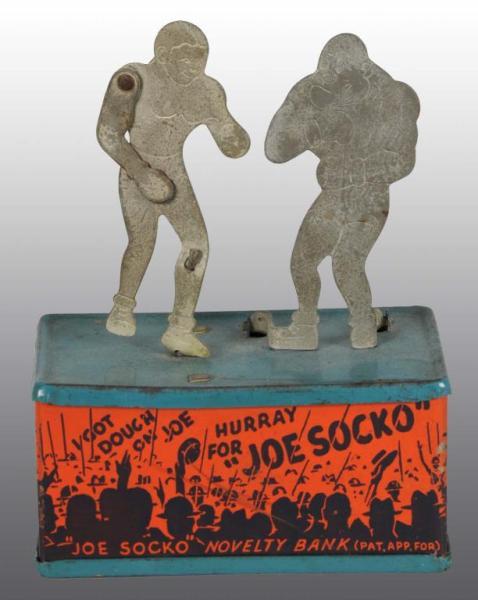 Appraisal: Tin Joe Socko Mechanical Bank Description Working Condition Excellent