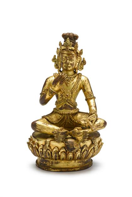 Appraisal: Sino-Tibetan gilt-bronze model of Vaisravana H in Of sectional castings